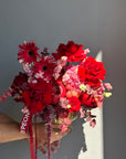 Flower arrangement “Red Apple” in the golden vase