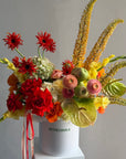 Flower Box “Object of Desire” — ranunculus, rose, anthurium, hydrangea, gerberas, decorative apple