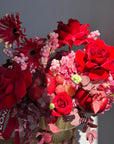 Flower arrangement “Red Apple” in the golden vase