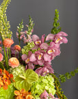 Vase Arrangement “Sunset Theory” — ranunculus, anthurium, hydrangea, orchids