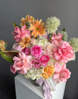 Vase Arrangement “Living in Color” — hydrangeas, gerberas, roses, lisianthus, allium, ranunculus