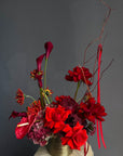Vase Arrangement “Burning Red” — roses, hydrangea, anthurium, calla lily, gerberas, decorative pomegranate