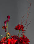 Vase Arrangement “Burning Red” — roses, hydrangea, anthurium, calla lily, gerberas, decorative pomegranate