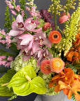 Vase Arrangement “Sunset Theory” — ranunculus, anthurium, hydrangea, orchids