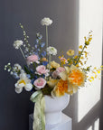 Interior Arrangement “Color Therapy” — ranunculus, roses, delphinium & seasonal blooms