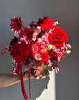 Flower arrangement “Red Apple” in the golden vase