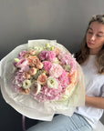 Bouquet “Pink Champagne” — ranunculus, hydrangea, garden roses, lisianthus