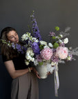 Vase Arrangement “Summer Poetry” — delphinium, peonies, roses, viburnum, lisianthus