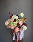 Flower arrangement in a pot “Alpha” — hydrangea, roses