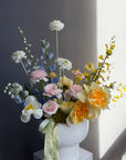 Interior Arrangement “Color Therapy” — ranunculus, roses, delphinium & seasonal blooms