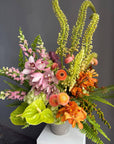 Vase Arrangement “Sunset Theory” — ranunculus, anthurium, hydrangea, orchids