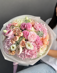 Bouquet “Pink Champagne” — ranunculus, hydrangea, garden roses, lisianthus