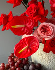 Interior arrangement in a vase “Nina” - roses, anthuriums