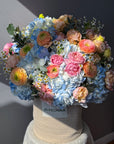 Basket "Big Bloom Energy" - Ranunculus, hydrangeas, roses