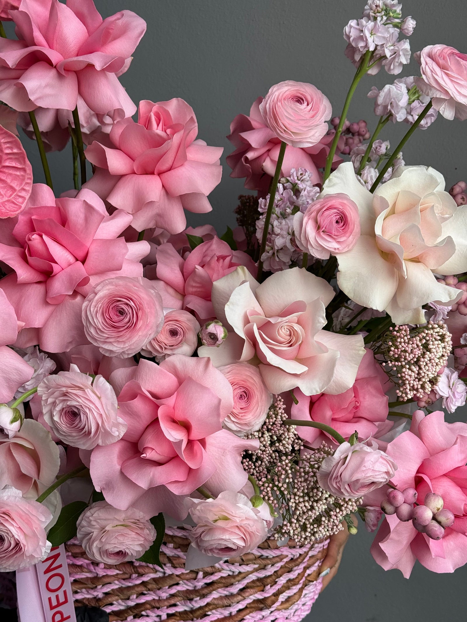 Flower Basket “Powder Shock” — anthurium, roses, ranunculus, gladioli