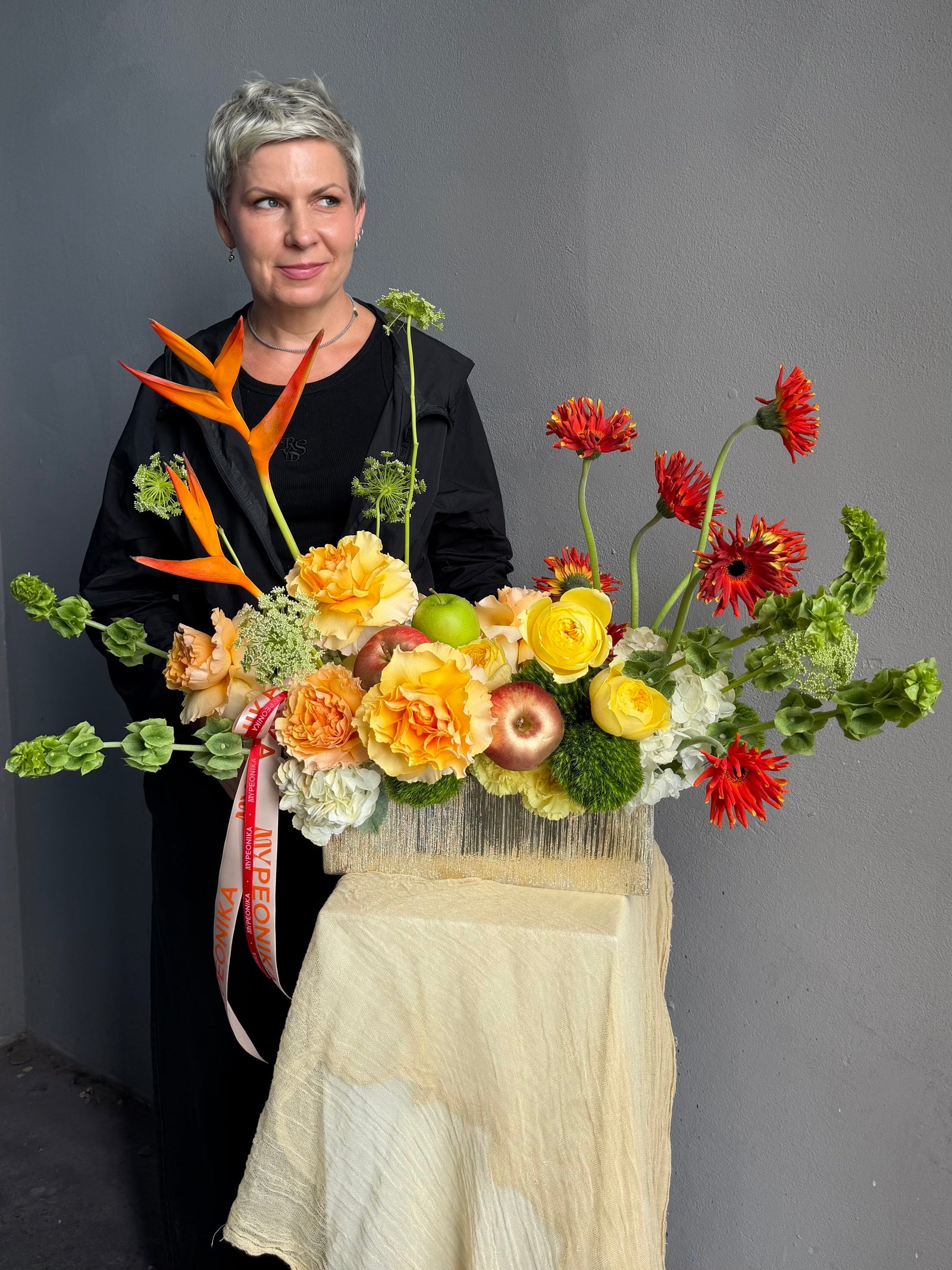 Vase Arrangement “No Beige” — gerberas, roses, green dianthus, hydrangea, viburnum, molucella, decorative apple