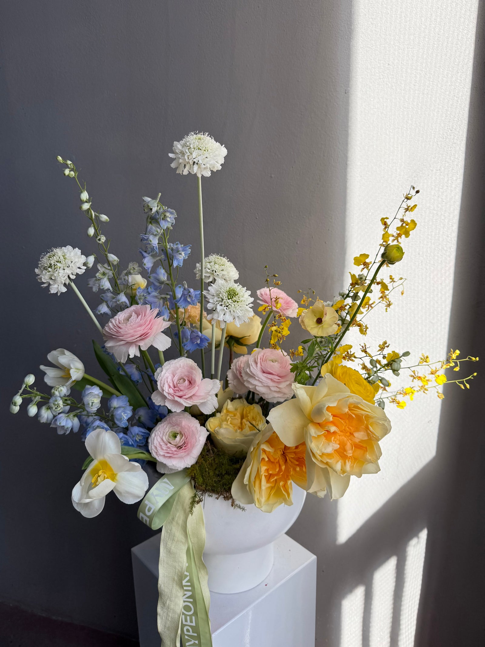 Interior Arrangement “Color Therapy” — ranunculus, roses, delphinium &amp; seasonal blooms