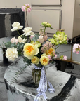 Floral arrangement in a vase «April Creature»-  lilacs, peony roses
