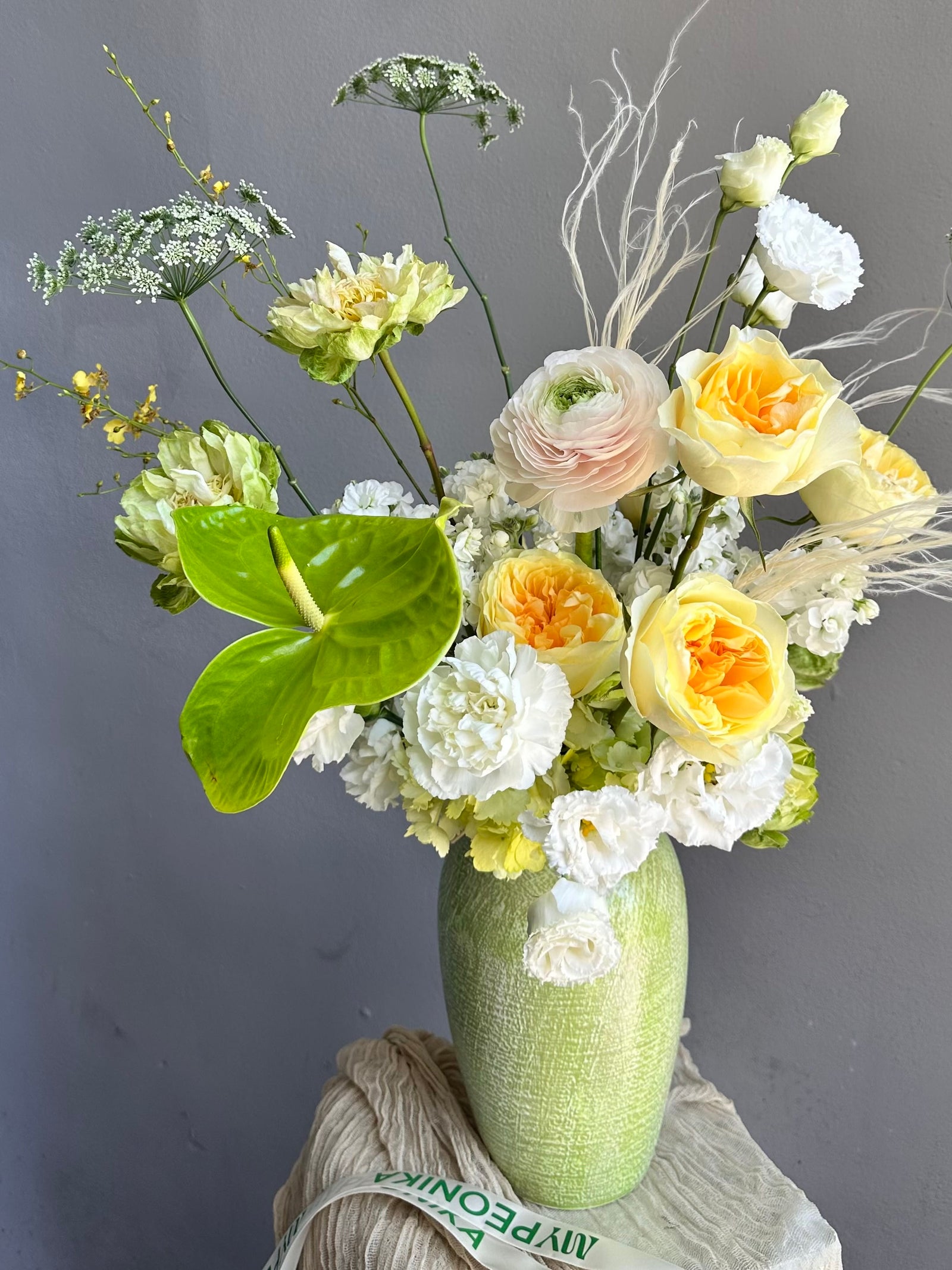Vase Arrangement “Soft Jungle” — roses, veggie roses, lisianthus, anthurium