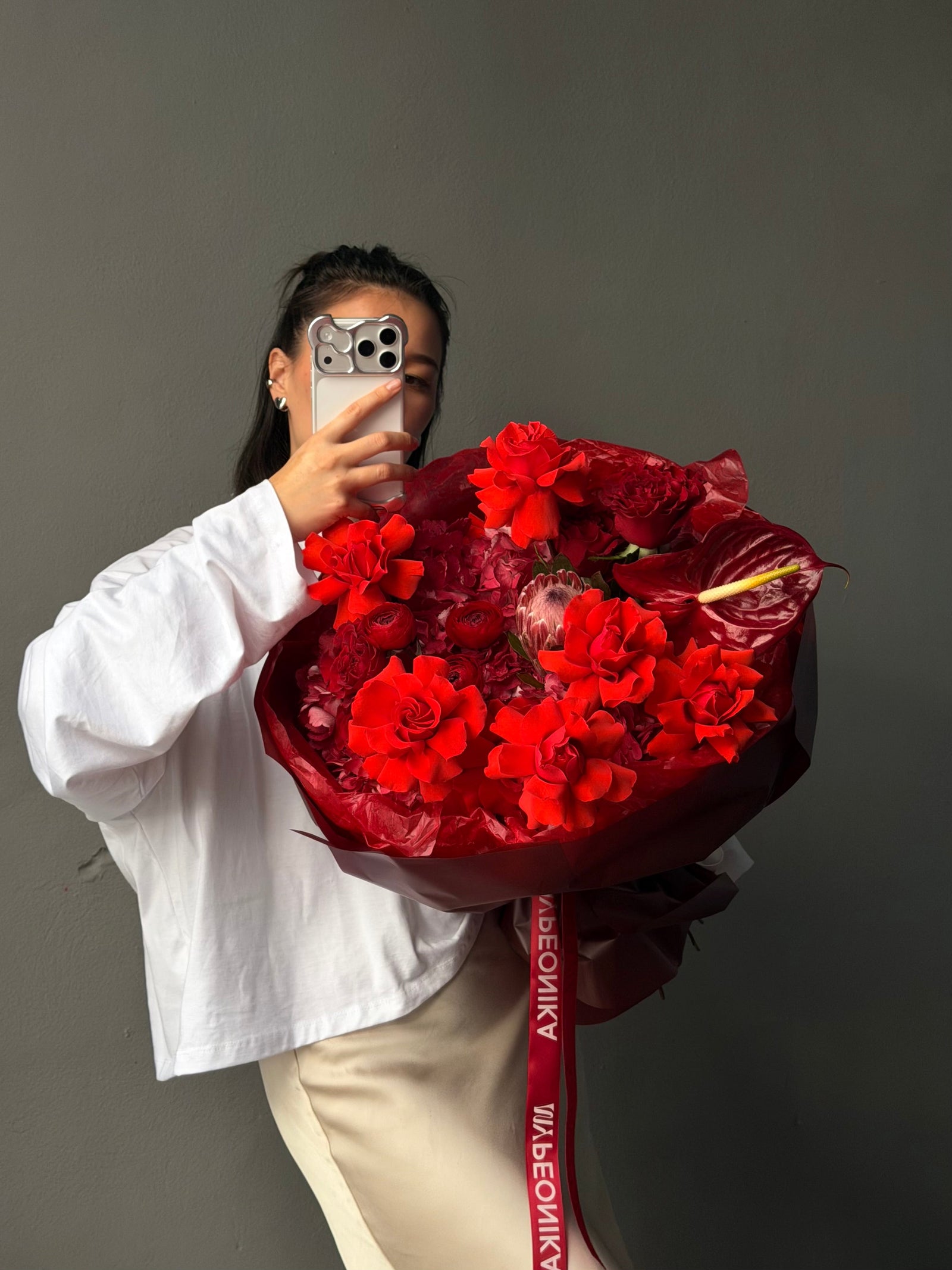 Bouquet “Kiss attack” — king protea, ranunculus, anthurium, rose