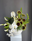 Interior Arrangement “Modern Muse” — orchid, anthurium, sunflower, calla lilies