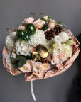 Bouquet “Merry Pine Delight” — roses, hydrangea, noble fir, pinecones