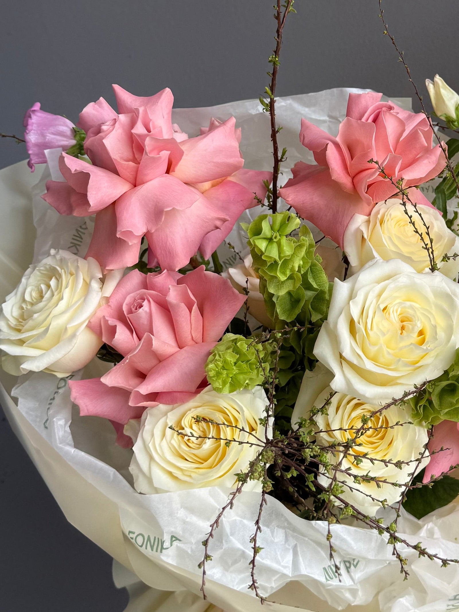 Bouquet “Into the Garden” — roses, campanula, molucella