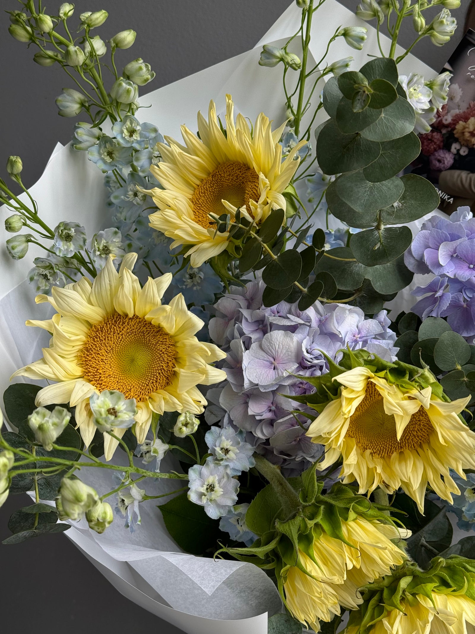 Bouquet “Radiant Smile” - sunflowers, delphiniums, hydrangeas