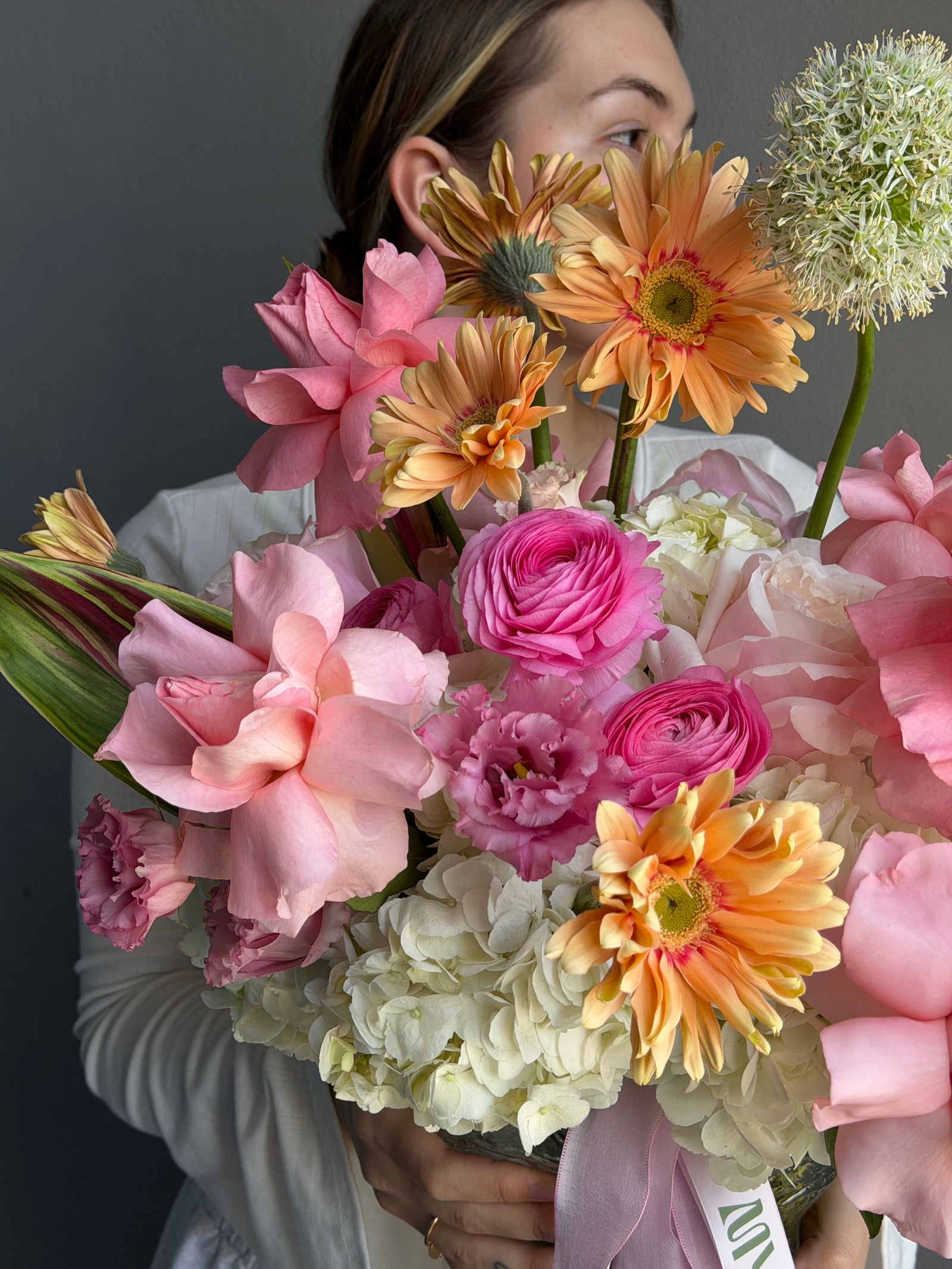 Vase Arrangement “Living in Color” — hydrangeas, gerberas, roses, lisianthus, allium, ranunculus
