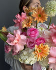 Vase Arrangement “Living in Color” — hydrangeas, gerberas, roses, lisianthus, allium, ranunculus