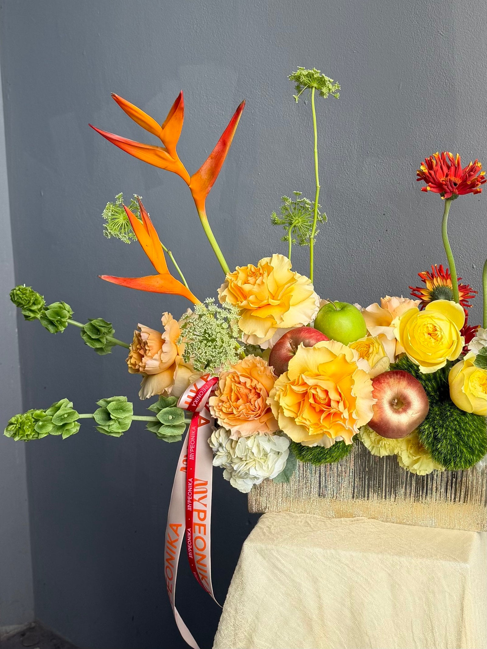 Vase Arrangement “No Beige” — gerberas, roses, green dianthus, hydrangea, viburnum, molucella, decorative apple