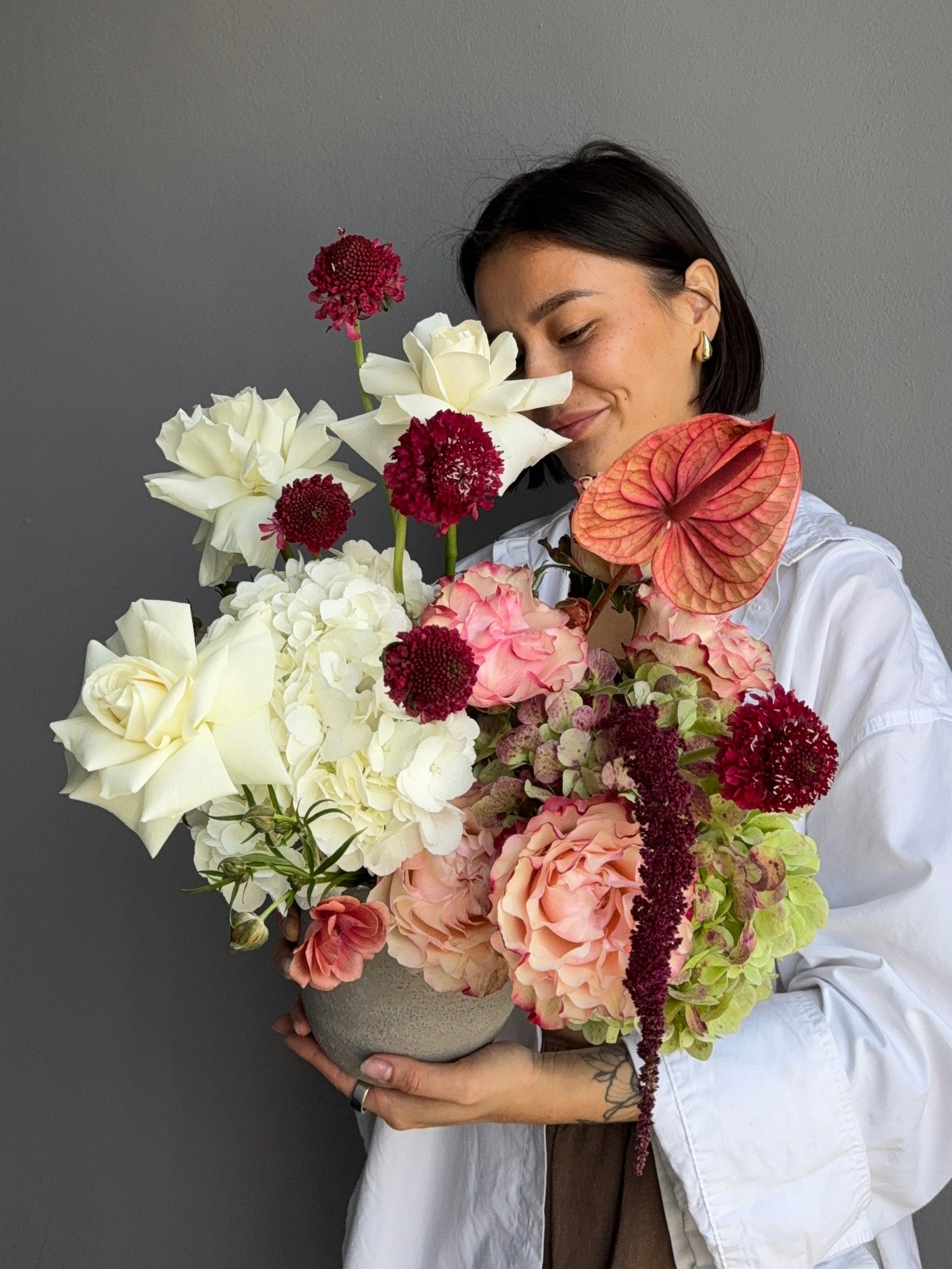 Flower arrangement in a clay pot “Omega” — hydrangea, roses
