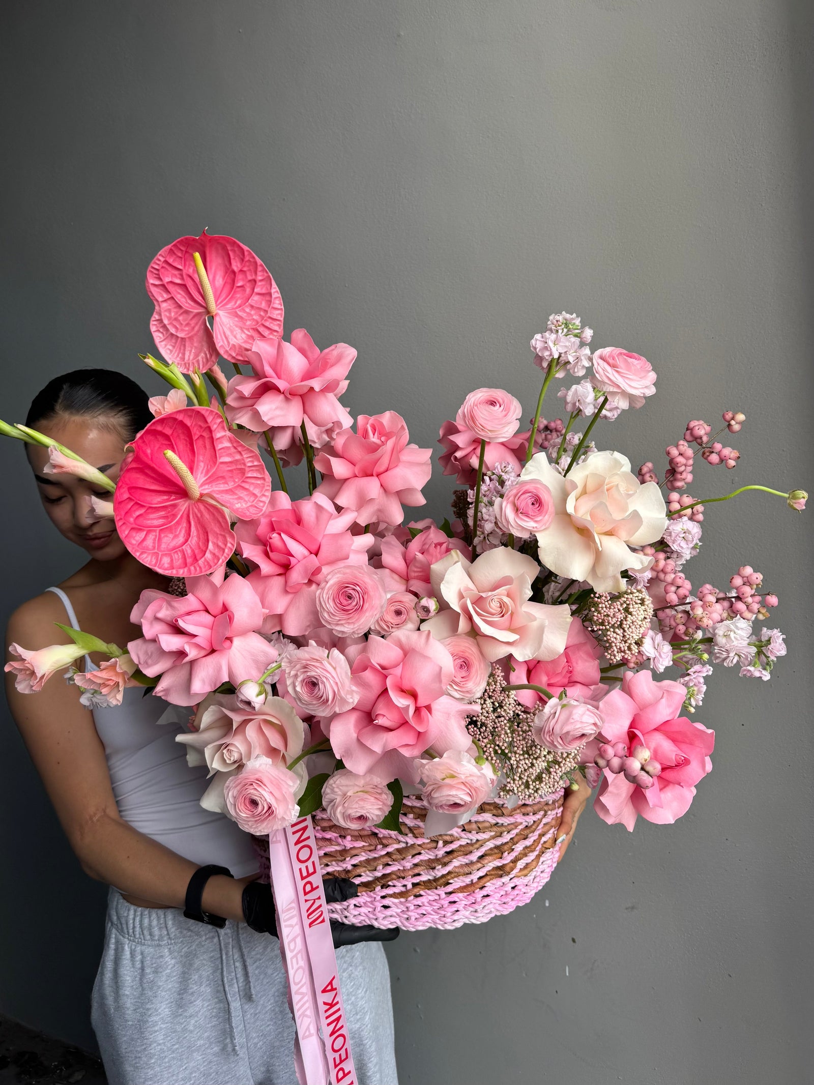 Flower Basket “Powder Shock” — anthurium, roses, ranunculus, gladioli
