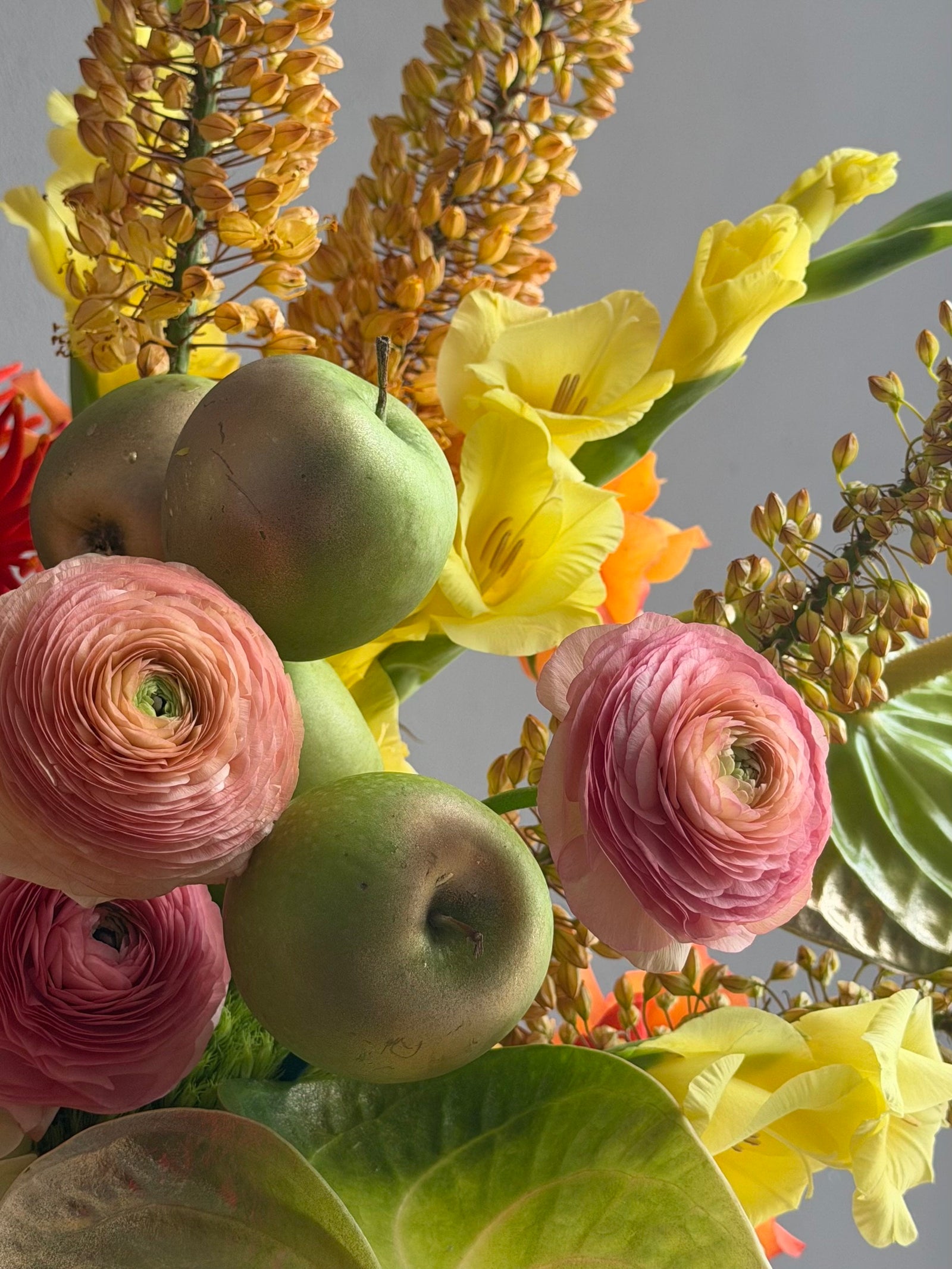 Flower Box “Object of Desire” — ranunculus, rose, anthurium, hydrangea, gerberas, decorative apple