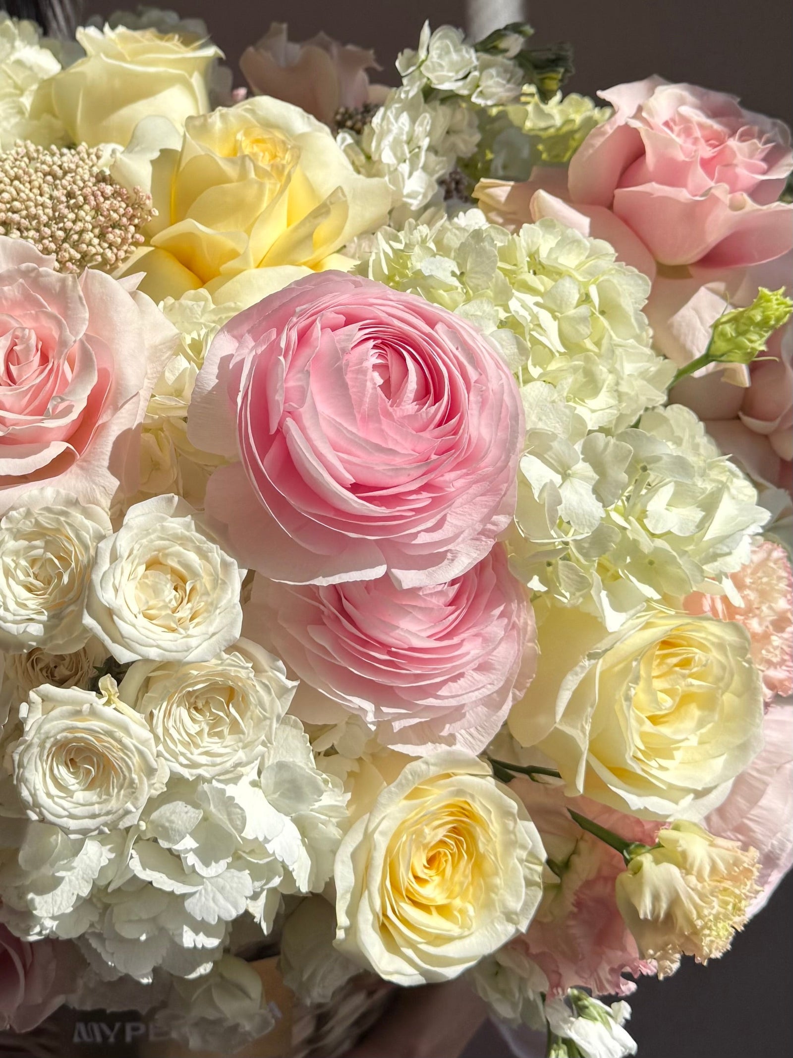 Flower Basket “Gentle Yes” — ranunculus, roses, hydrangea