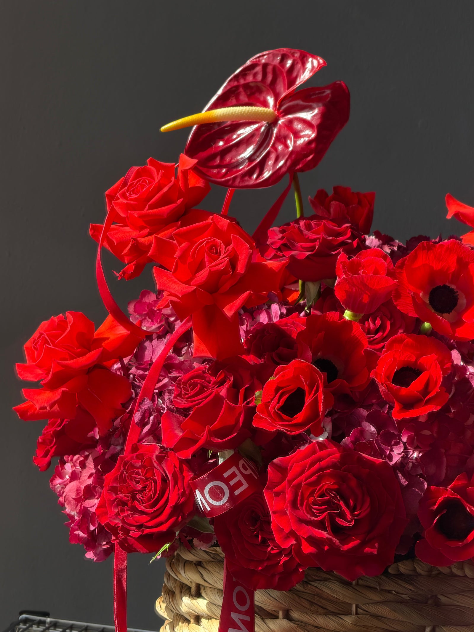 Flower Basket “Body Language” — anemones, roses, anthurium, hydrangea
