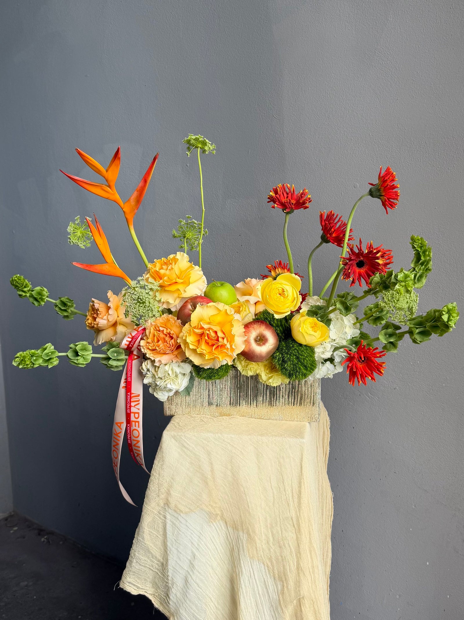 Vase Arrangement “No Beige” — gerberas, roses, green dianthus, hydrangea, viburnum, molucella, decorative apple