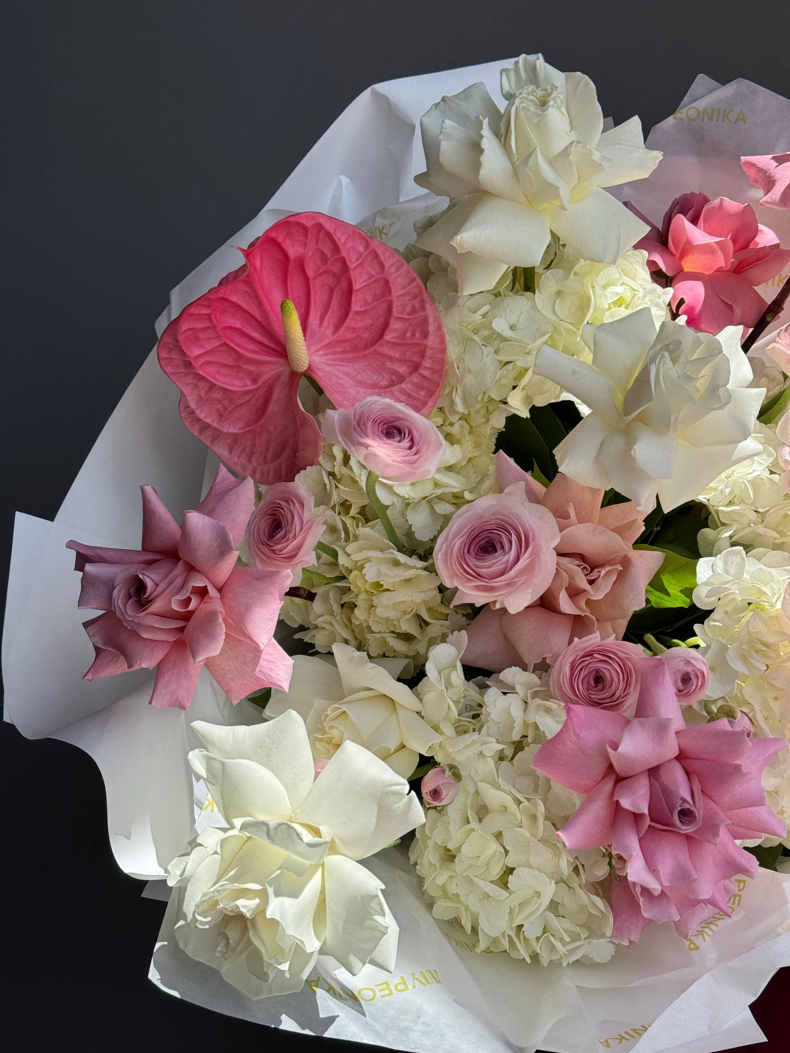 Bouquet “Vanilla Taste” — anthurium, roses, ranunculus, hydrangea