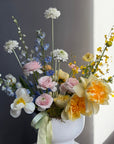 Interior Arrangement “Color Therapy” — ranunculus, roses, delphinium & seasonal blooms
