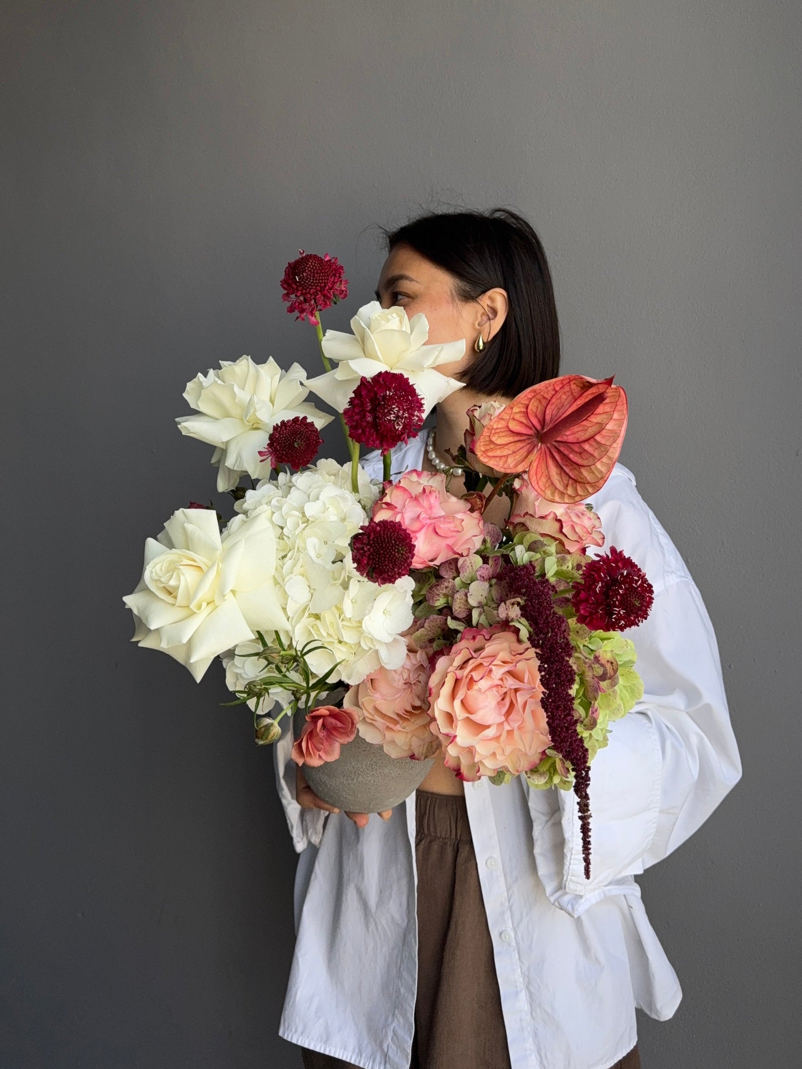 Flower arrangement in a clay pot “Omega” — hydrangea, roses
