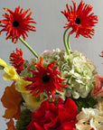 Flower Box “Object of Desire” — ranunculus, rose, anthurium, hydrangea, gerberas, decorative apple
