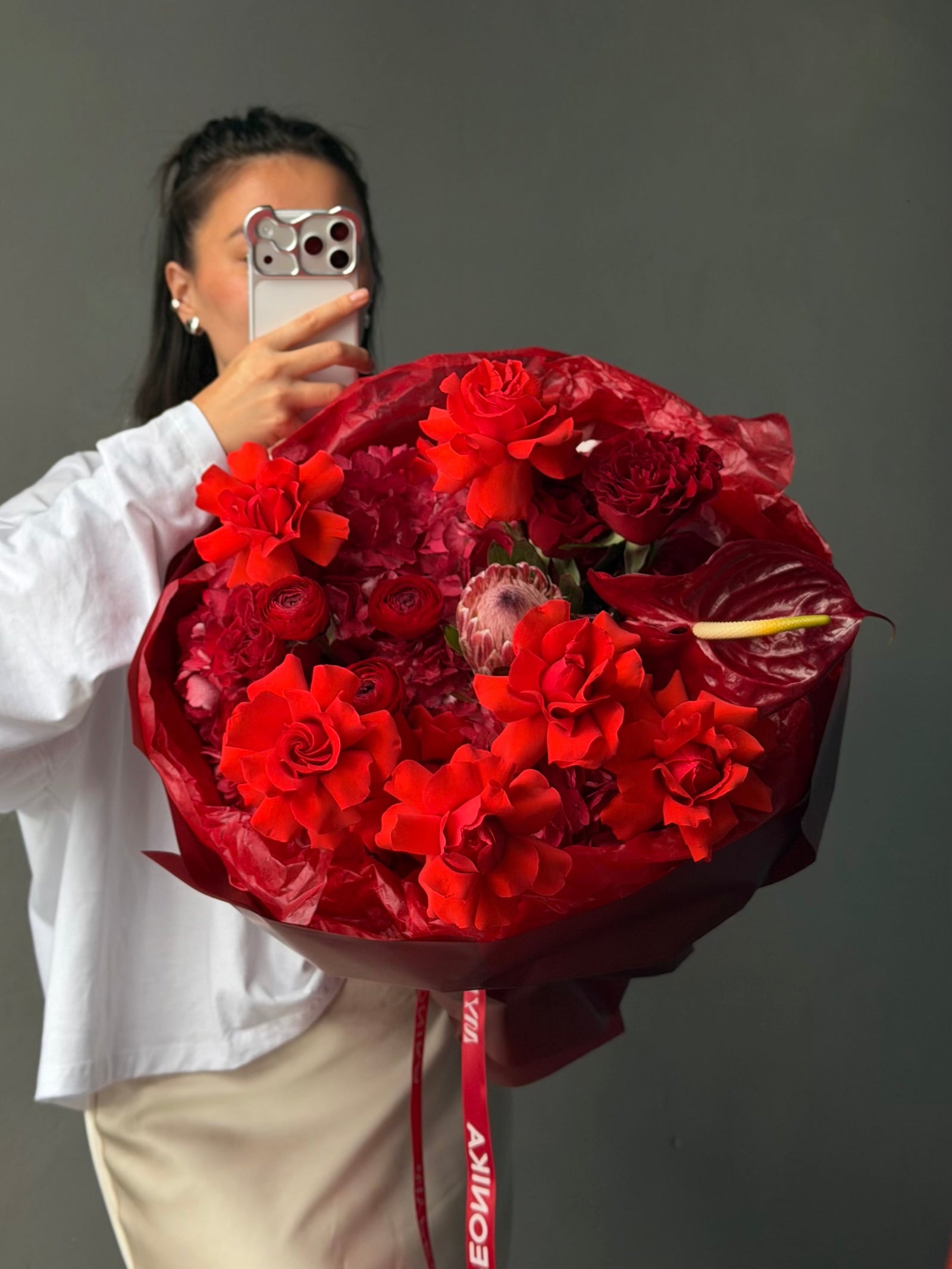 Bouquet “Kiss attack” — king protea, ranunculus, anthurium, rose