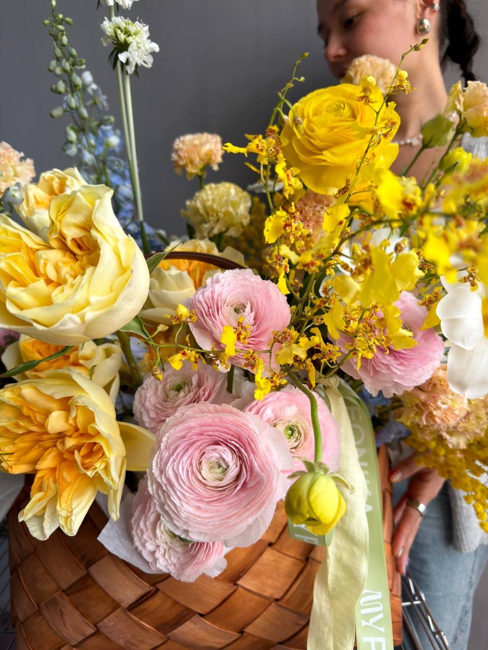 Flower Basket “Hello, Sunshine!” — ranunculus, roses, delphinium, carnations, mimosa &amp; seasonal blooms