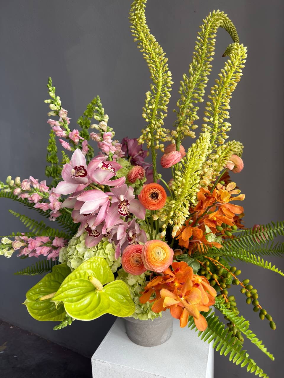 Vase Arrangement “Sunset Theory” — ranunculus, anthurium, hydrangea, orchids