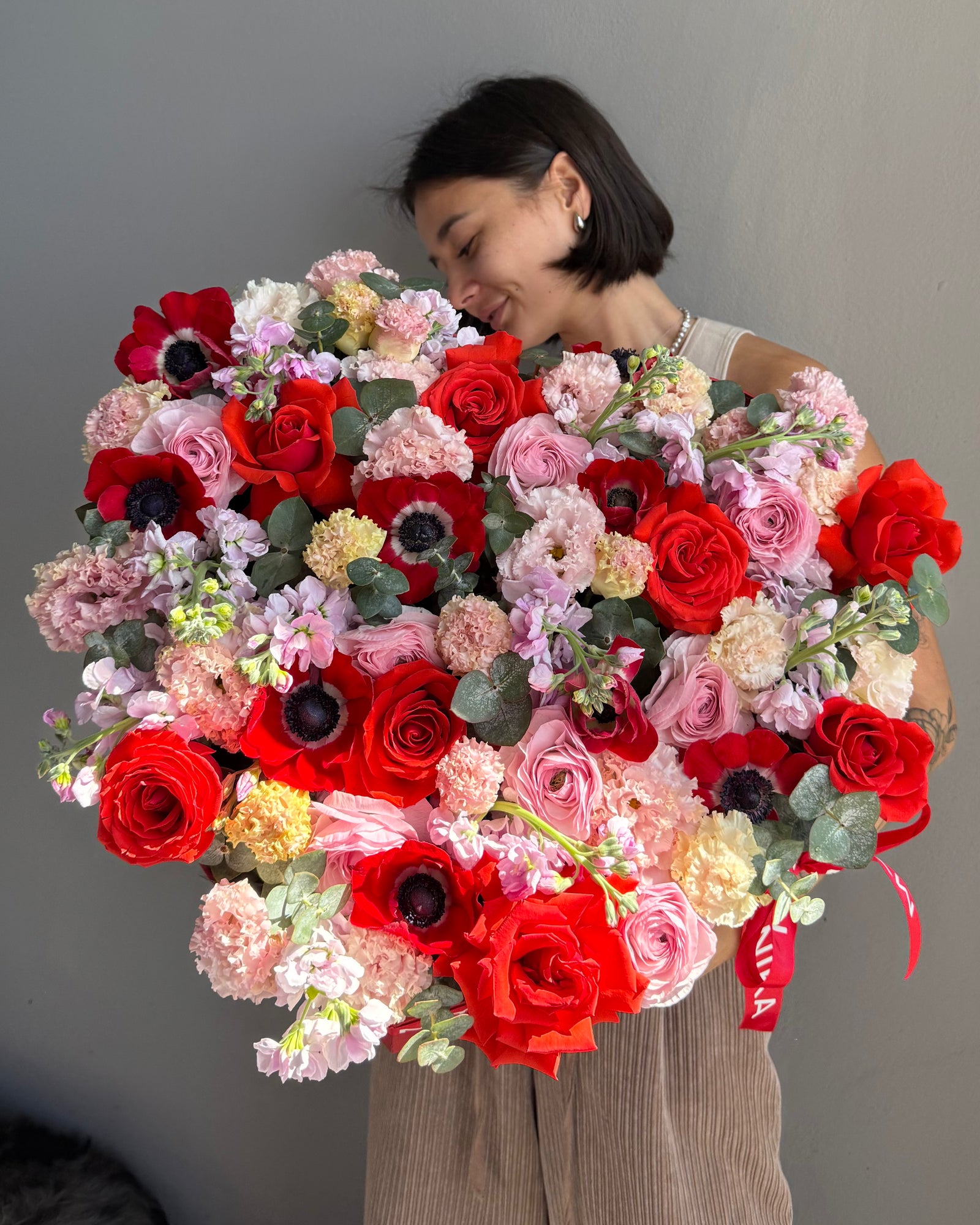 Heart-shaped flower box “Too hot to handle” - anemones, ranunculus, roses