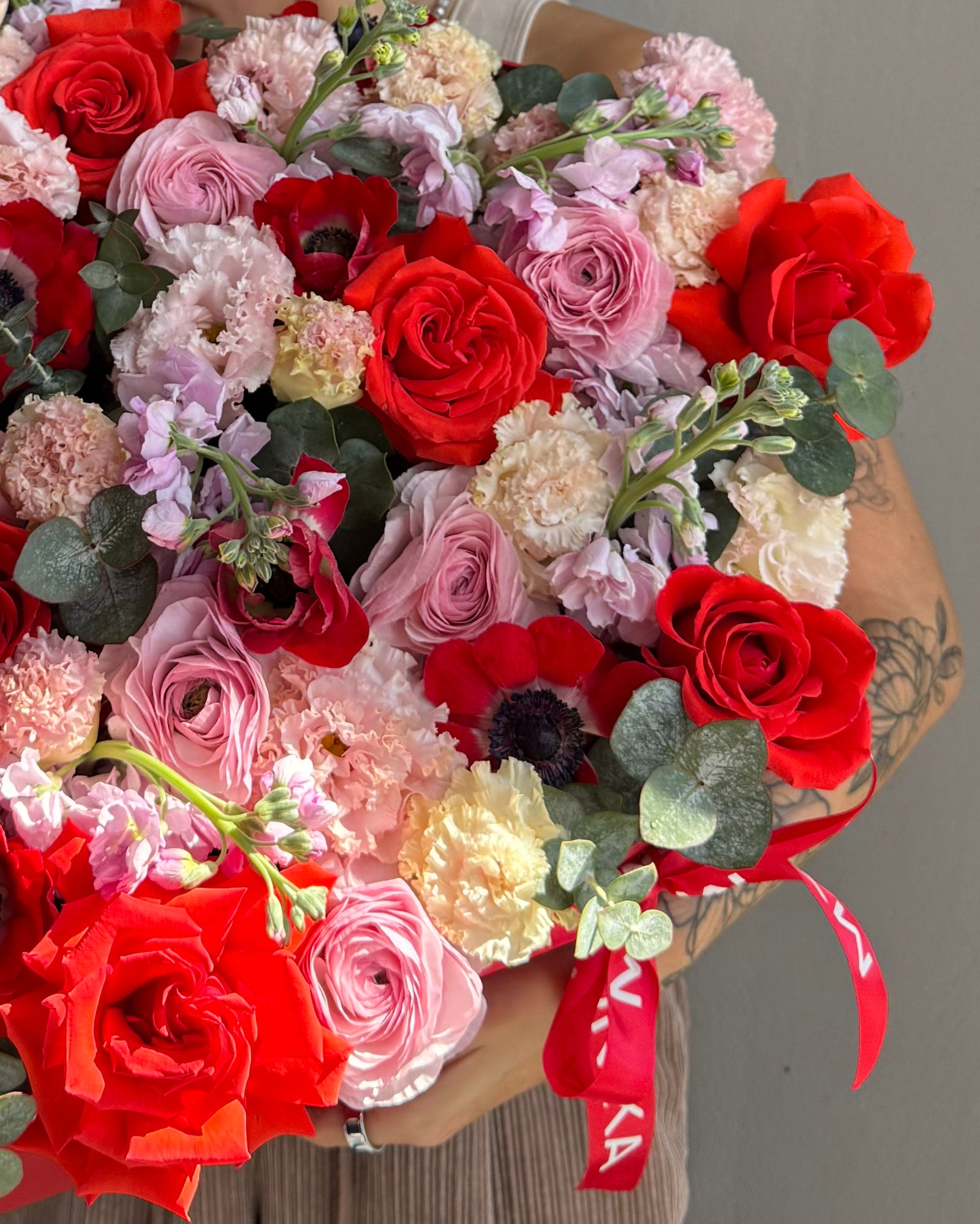 Heart-shaped flower box “Too hot to handle” - anemones, ranunculus, roses