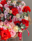 Heart-shaped flower box “Too hot to handle” - anemones, ranunculus, roses