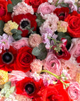 Heart-shaped flower box “Too hot to handle” - anemones, ranunculus, roses