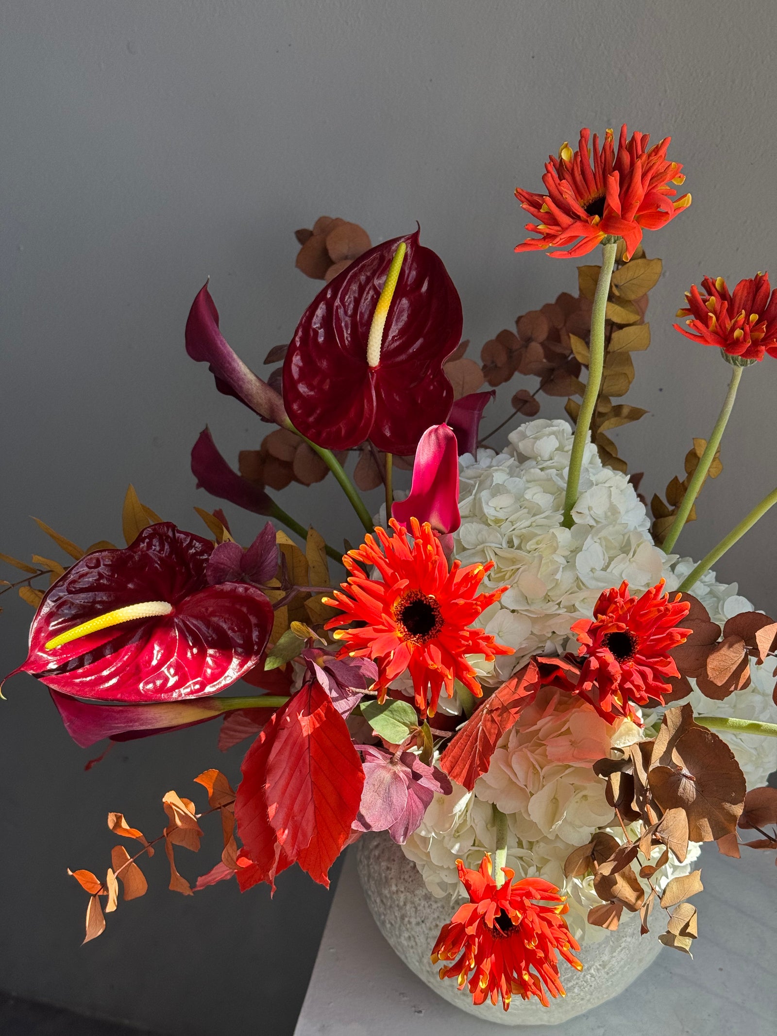Interior arrangement in a vase "Orange Is the New Bloom"