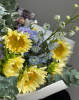 Bouquet “Radiant Smile” - sunflowers, delphiniums, hydrangeas